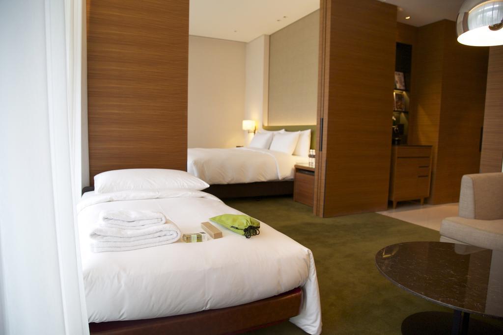 Eslite Hotel Тайбей Номер фото